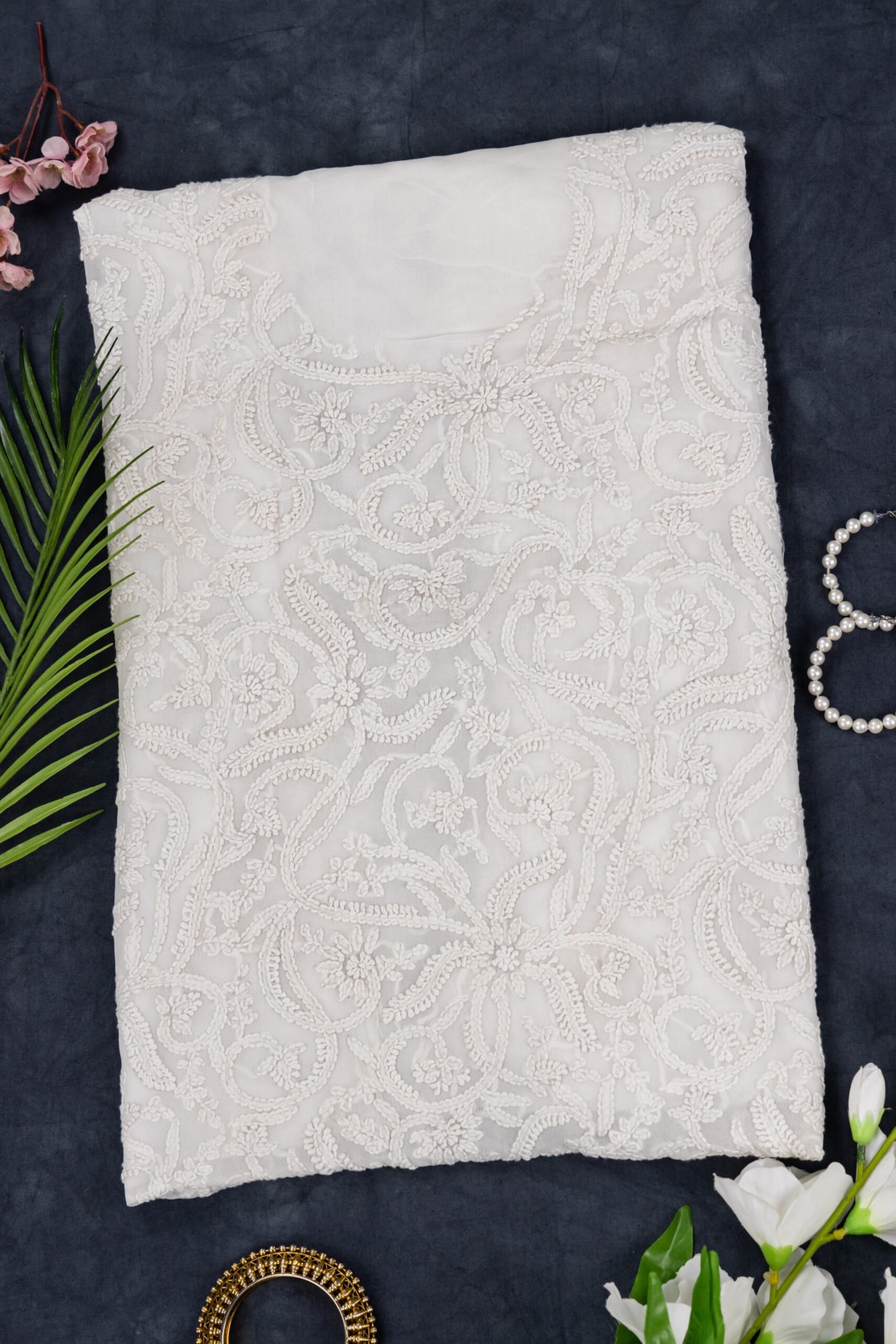Adrika's exquisite hand-embroidered Georgette unstitched kurta