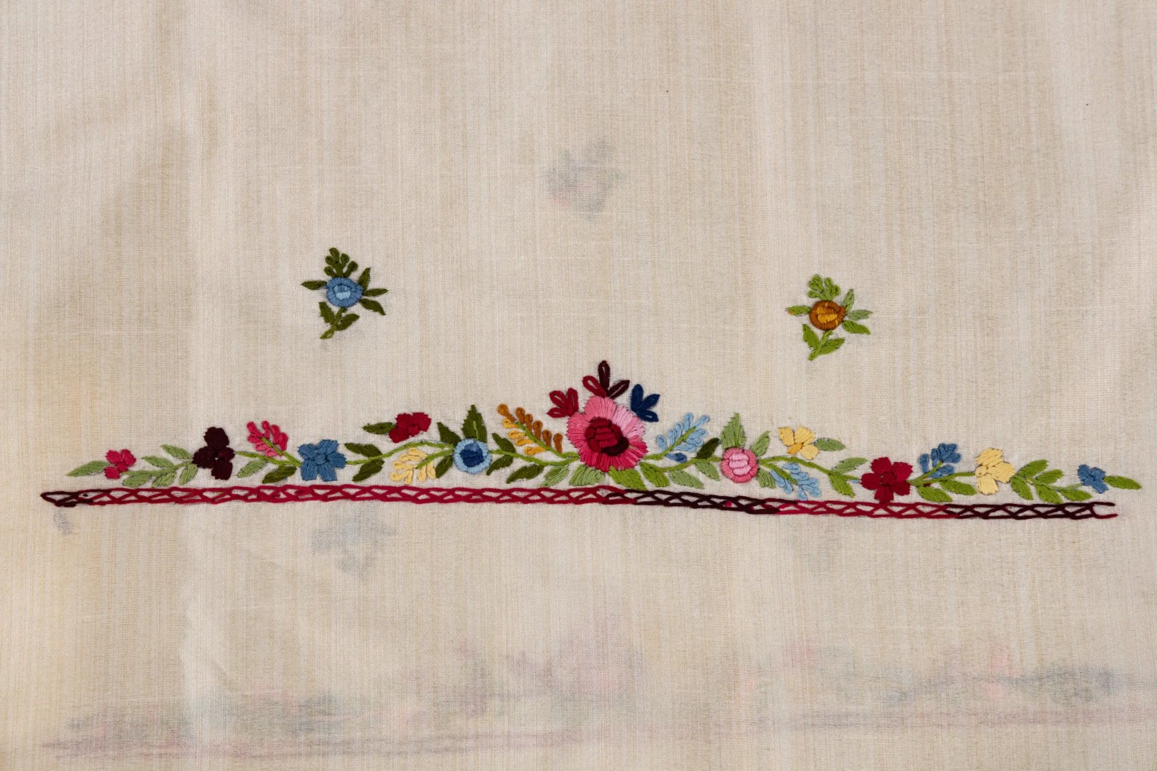 Unstitched Semi Tussar kurta with detailed hand embroidery by Adrika