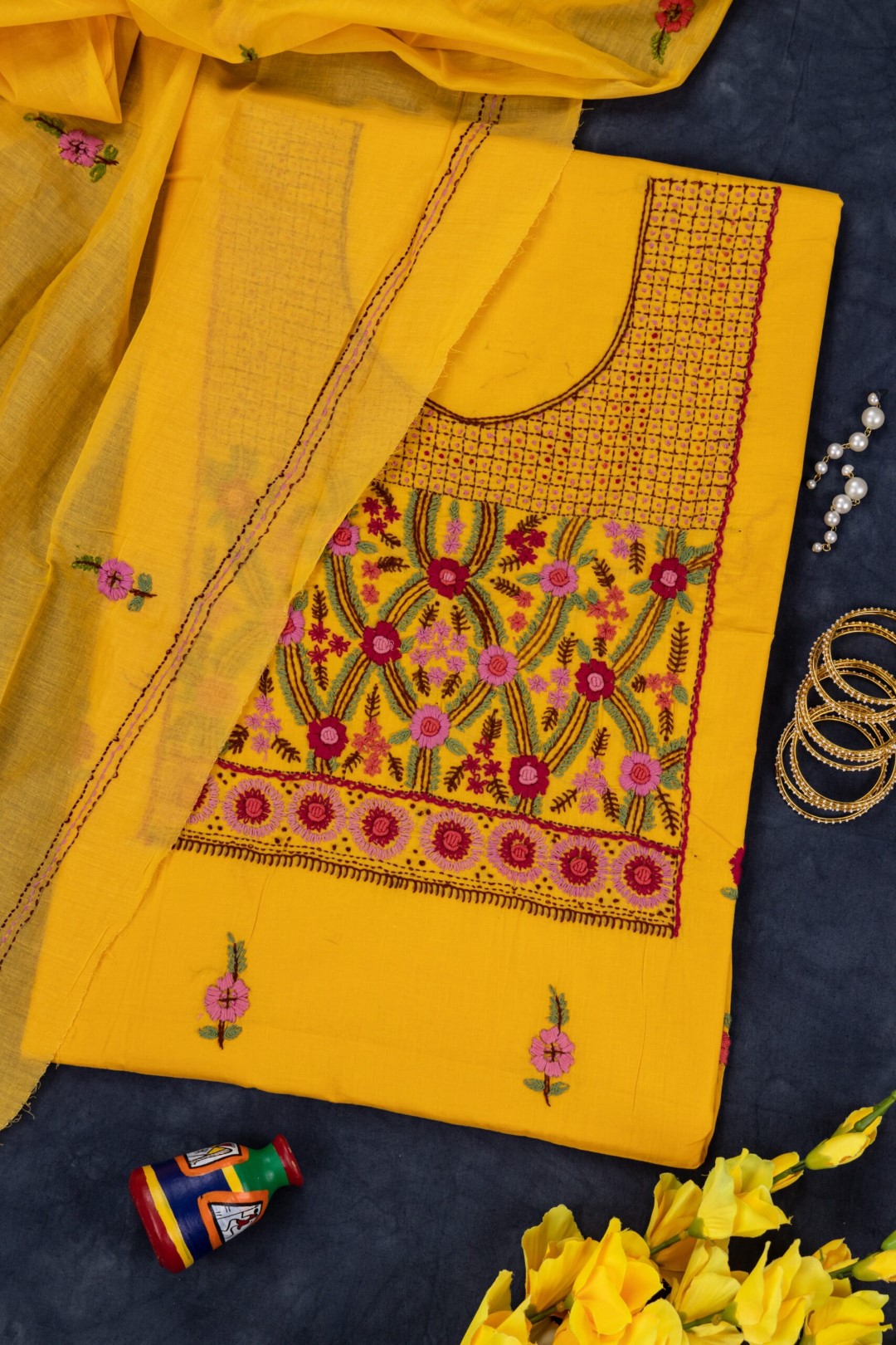 Adrika’s hand-embroidered unstitched cotton 3 piece kurta set in soft colors"