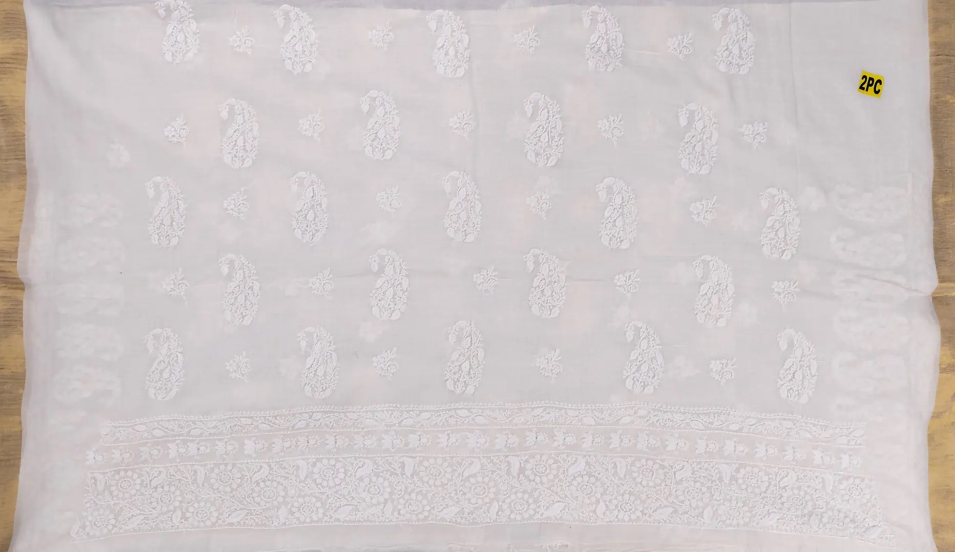 Adrika's luxurious Lucknow Chikankari Off White Mangalgiri Cotton Unstitched 2-Piece Kurti Set with intricate detailing"