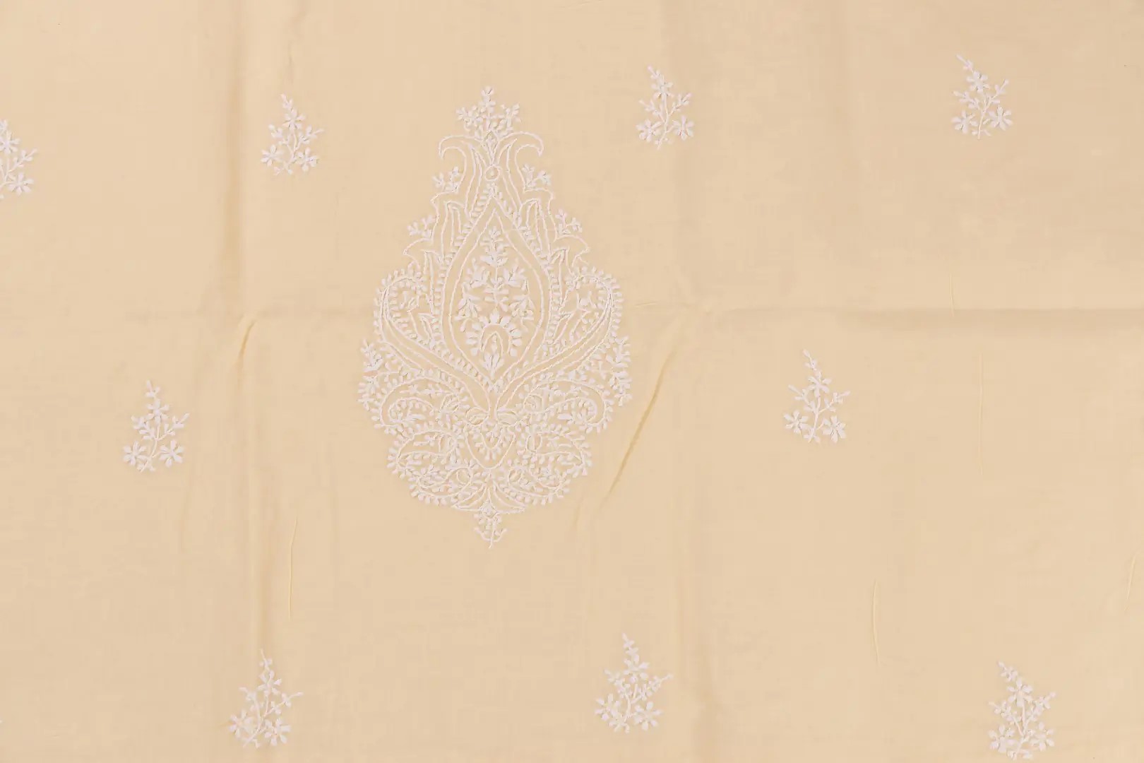 Adrika's luxurious Lucknow Chikankari Lemon Yellow Cotton Unstitched 3-Piece Kurti Set with intricate detailing