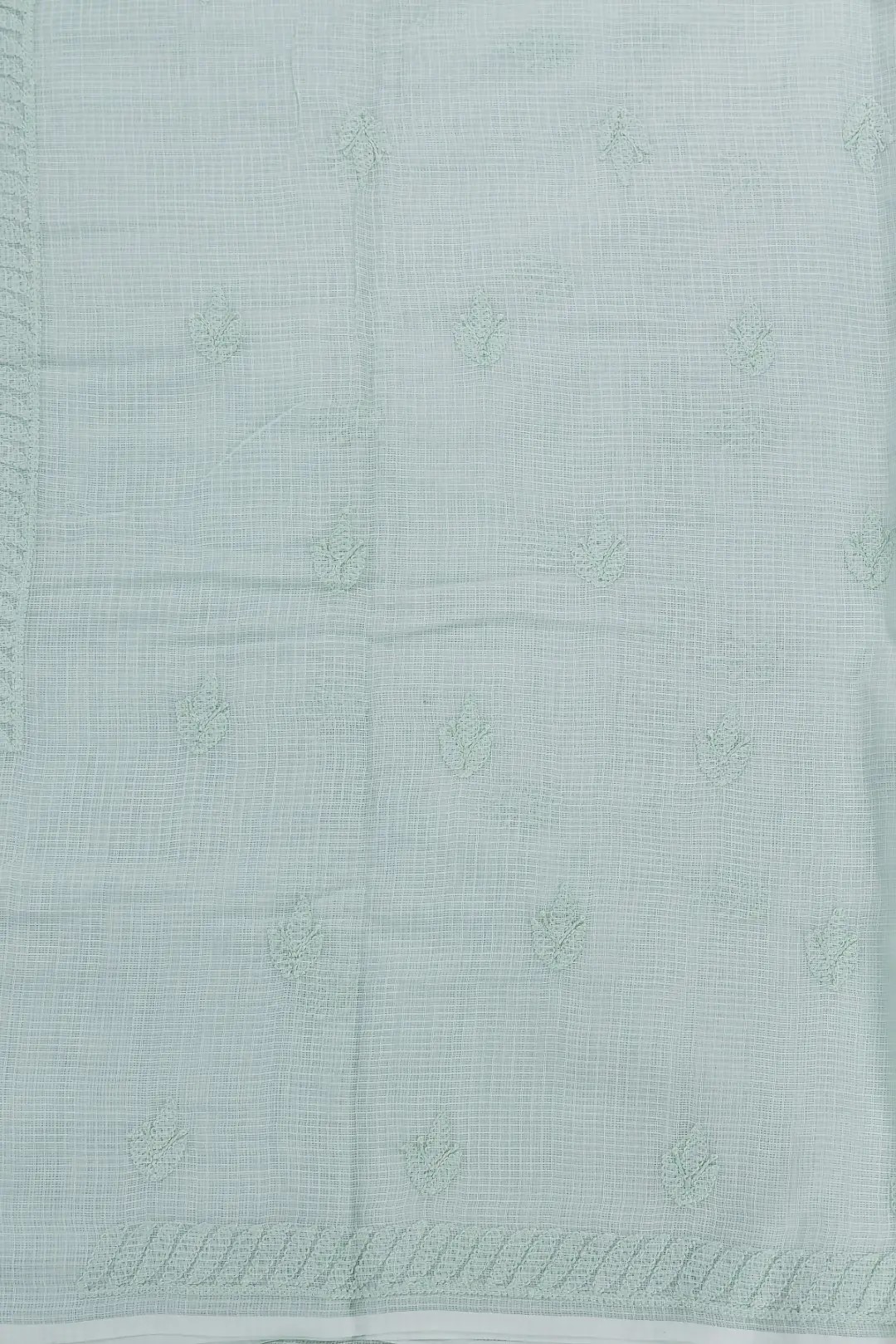 Adrika's luxurious Lucknow Chikankari Fern Green Kota Cotton Unstitched 3-Piece Kurti Set with intricate detailing